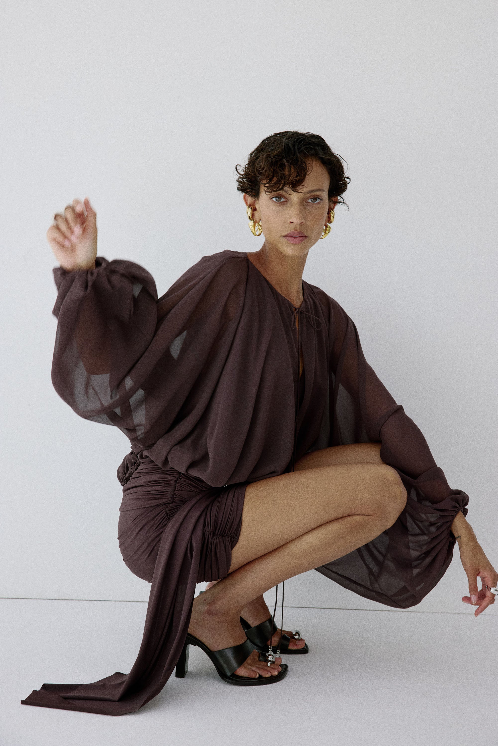VIDA MINI SKIRT IN UMBER BROWN SPANDEX JEREY