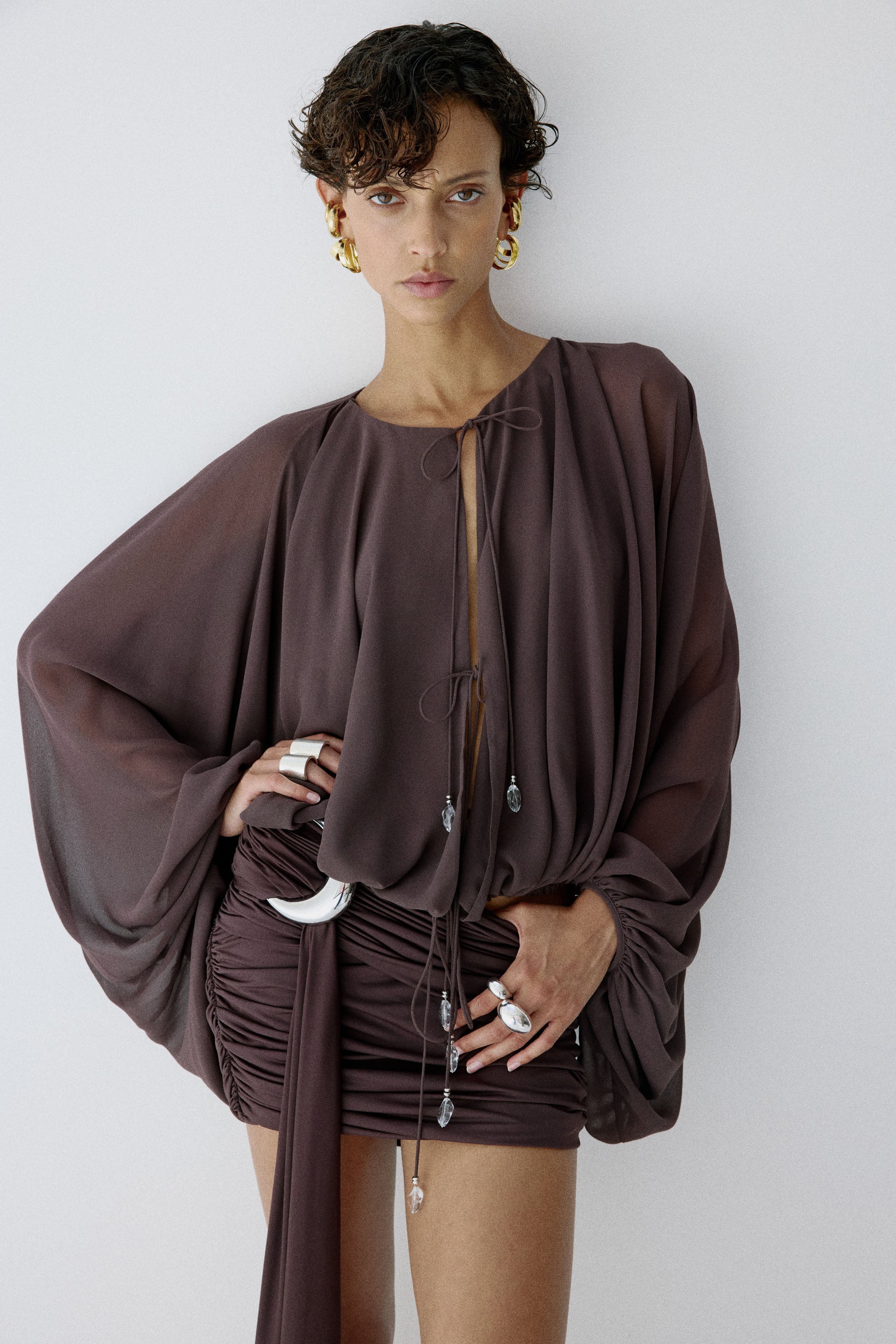 VIDA MINI SKIRT IN UMBER BROWN SPANDEX JEREY
